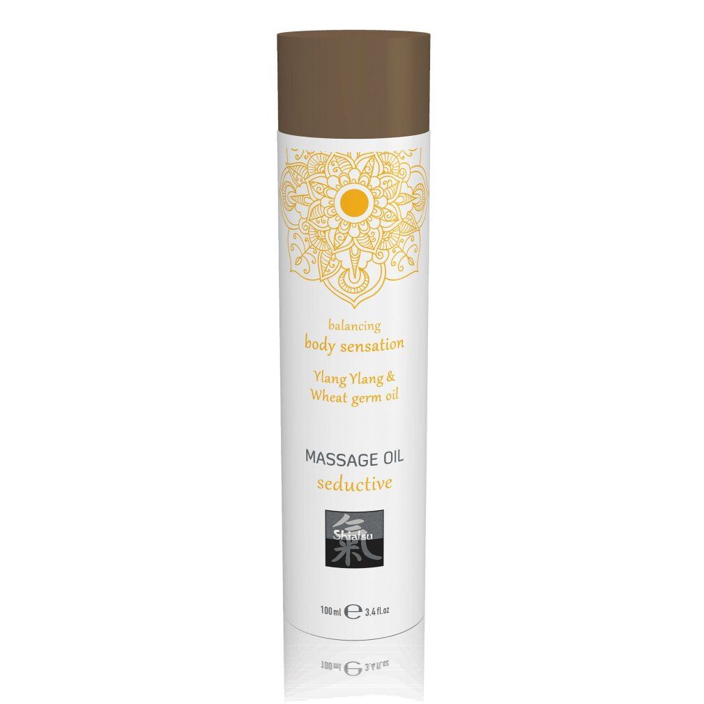 Massageöl Extase Flasche mit Orange & Sandelholzöl. Weiß mit orangem Muster.
