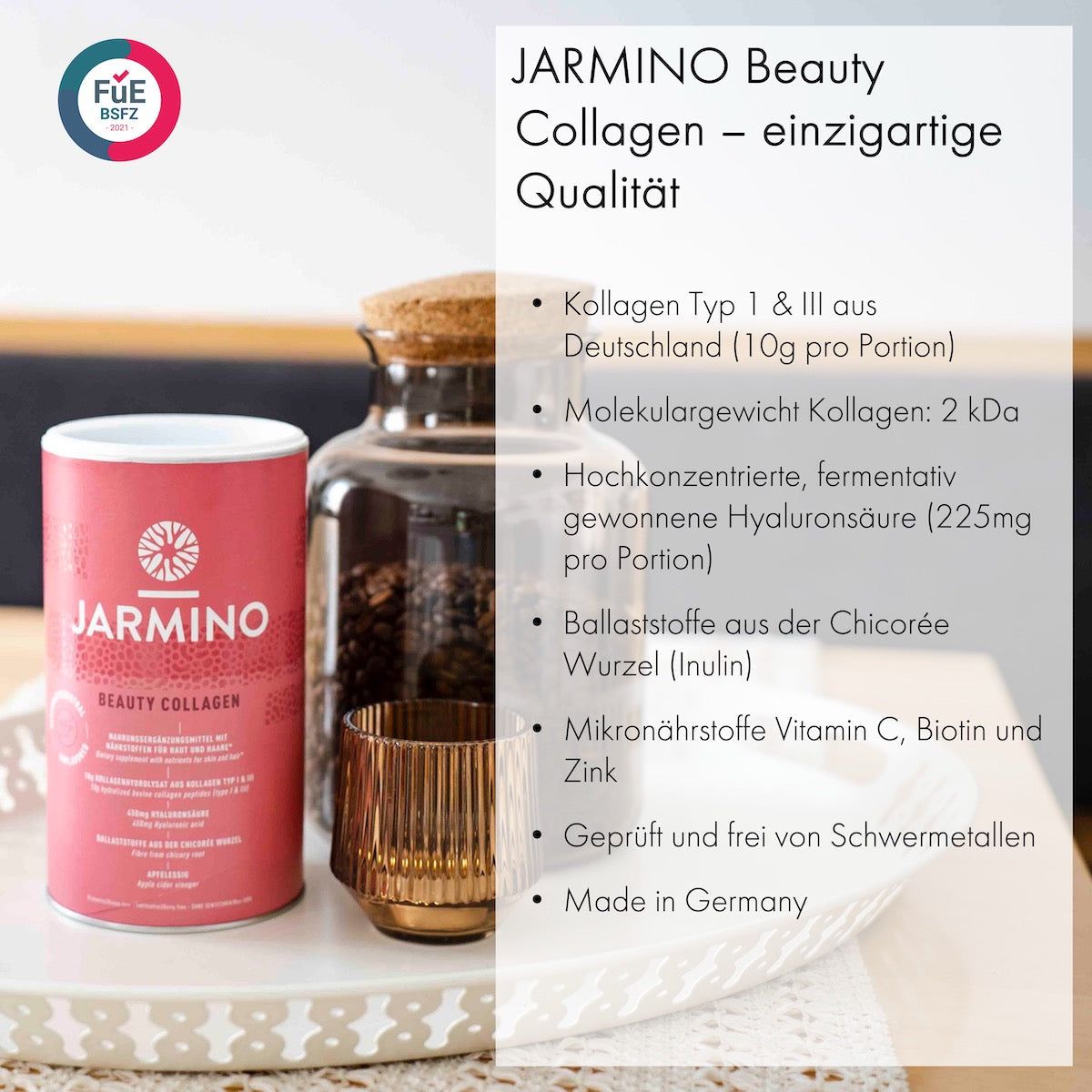 Rosa Dose Jarmino Beauty Kollagen, daneben Glasbehälter und Dekoration. Text: Kollagen, Hyaluronsäure, Inulin, Vitamine.