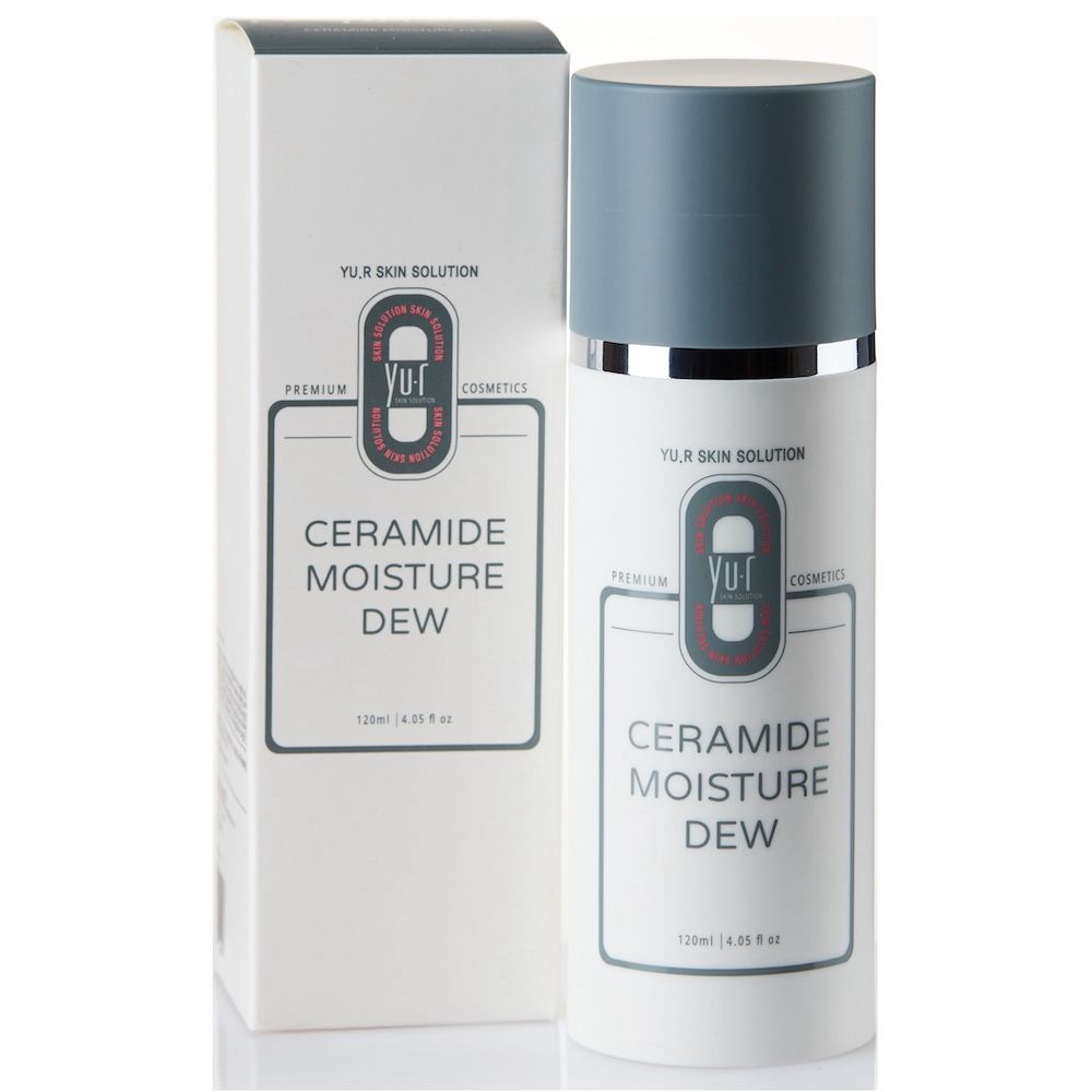 Weiße Lotion-Flasche mit blauem Deckel und Verpackung. Aufschrift: Ceramide Moisture Dew. Marke: Yu.R Skin Solution.