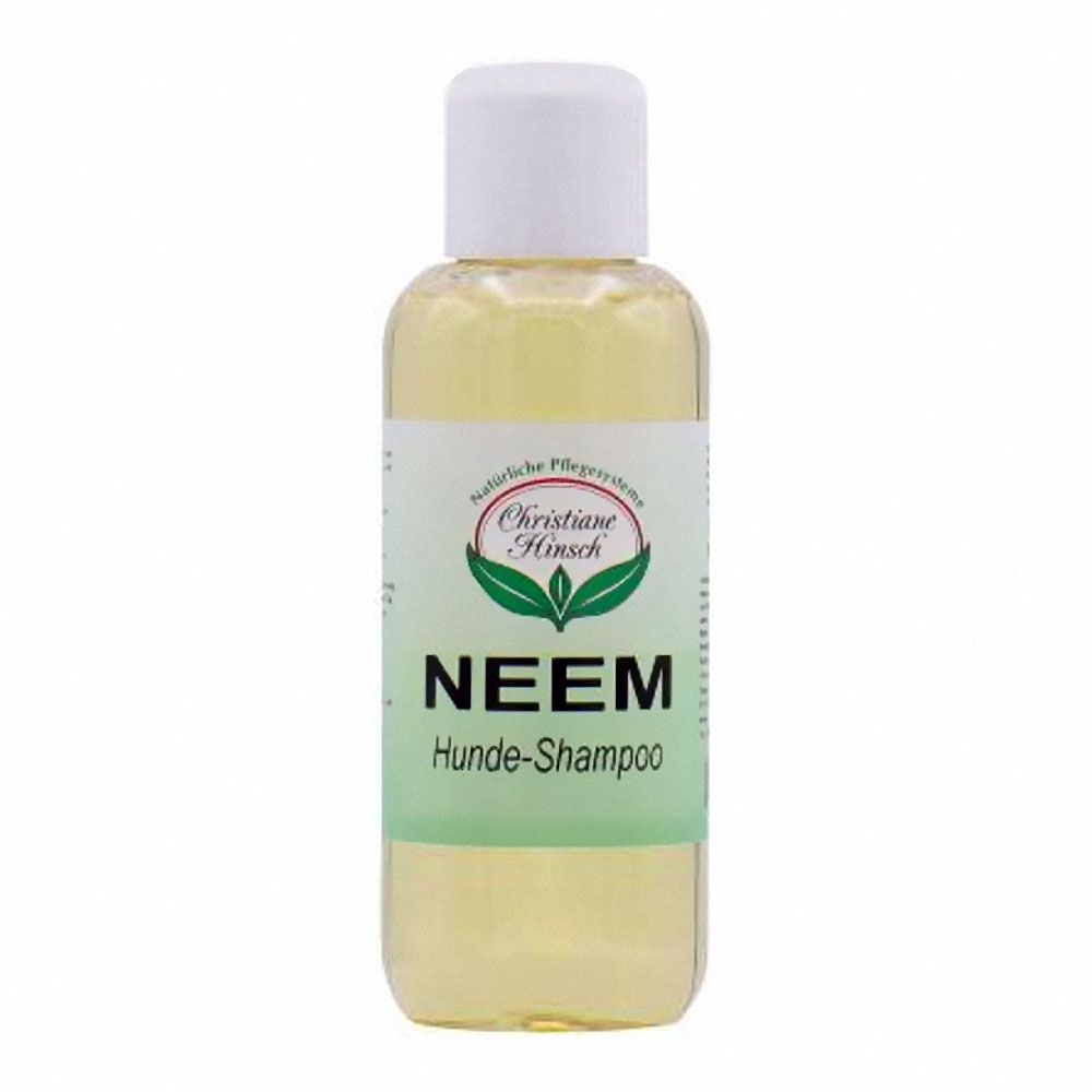 Flasche mit Shampoo. Etikett mit Logo und Schriftzug: Neem Hunde-Shampoo. Weiße Kappe.