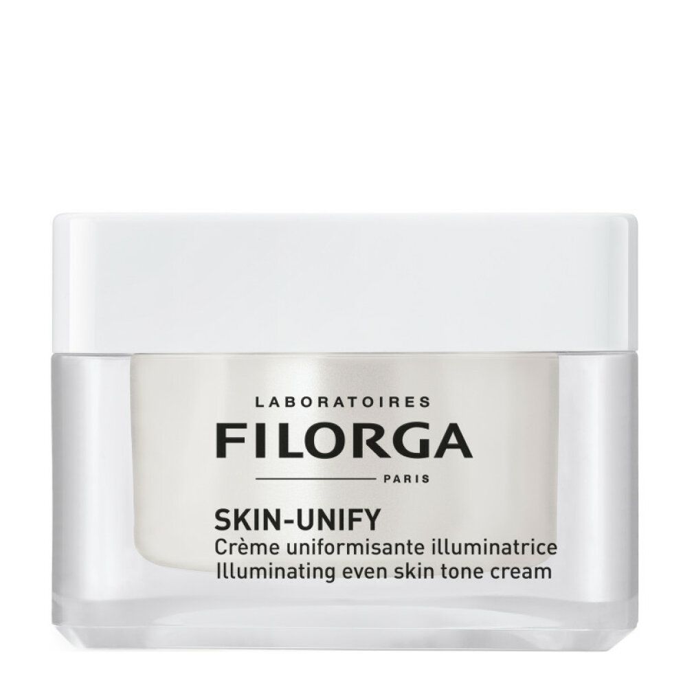 Verpackung von Filorga Skin-Unify Creme. Schwarzer Karton mit weißer Schrift. Produktabbildung und Logo.