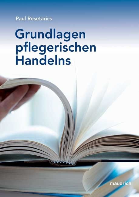 Buch mit dem Titel "Grundlagen pflegerischen Handelns" von Paul Resetarics. Geöffnete Seiten, blaue und weiße Farbgebung.