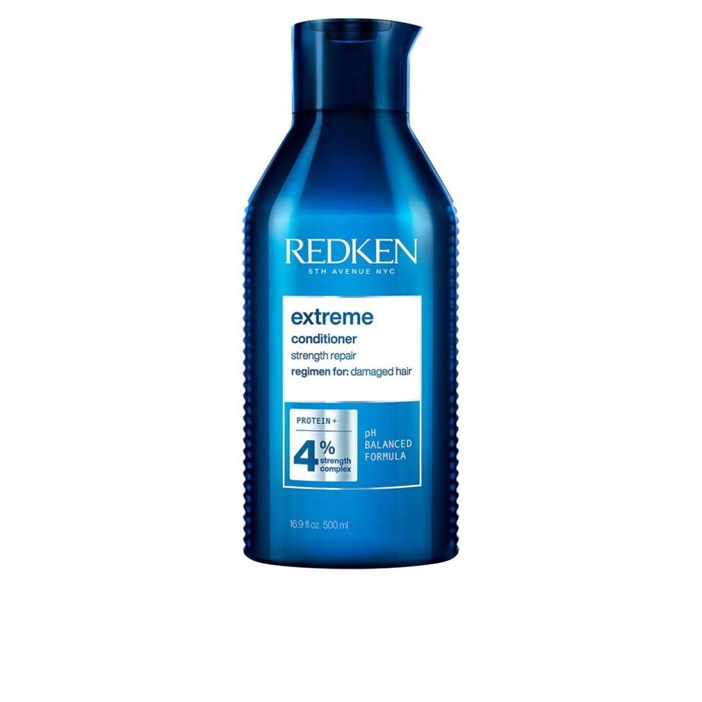 Blaues Redken Extreme Conditioner. Flasche mit weißem Etikett. Text: Extreme, strength repair, pH Balanced Formula, 500ml.