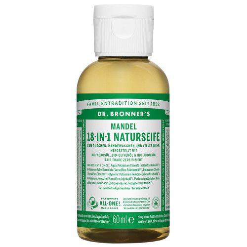 Eine Flasche Mandel Naturseife. Weißer Deckel, grünes Etikett mit Produktinformationen. Aufschrift: Dr. Bronner's 18-in-1 Naturseife, 60ml.