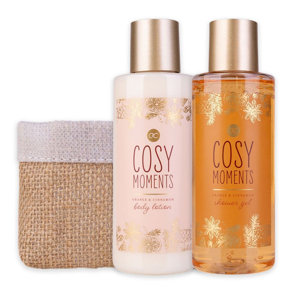 Zwei Flaschen und ein Korb. Aufschrift "Cosy Moments Orange & Cinnamon". Eine Flasche Duschgel, eine Lotion.