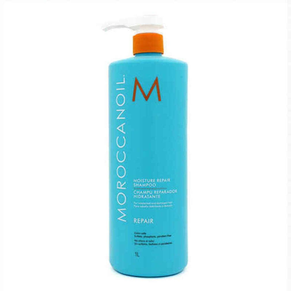 Türkisfarbene Shampoo-Flasche mit weißem Pumpkopf. Aufschrift: Moroccanoil, Moisture Repair Shampoo, Repair. Orangefarbenes Logo.