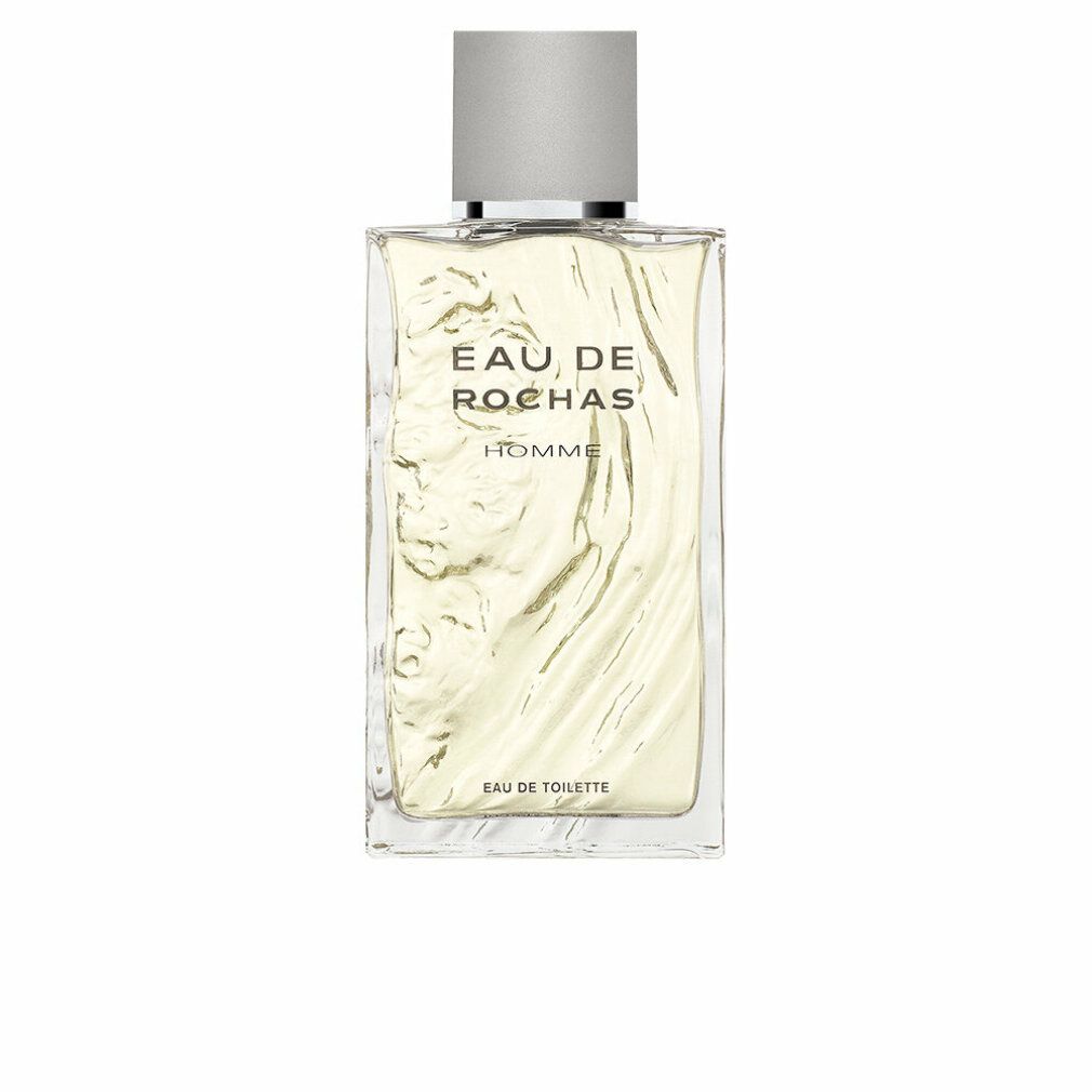 Rechteckiger Flakon mit silbernem Deckel. Aufschrift: EAU DE ROCHAS HOMME. Unterhalb: EAU DE TOILETTE.