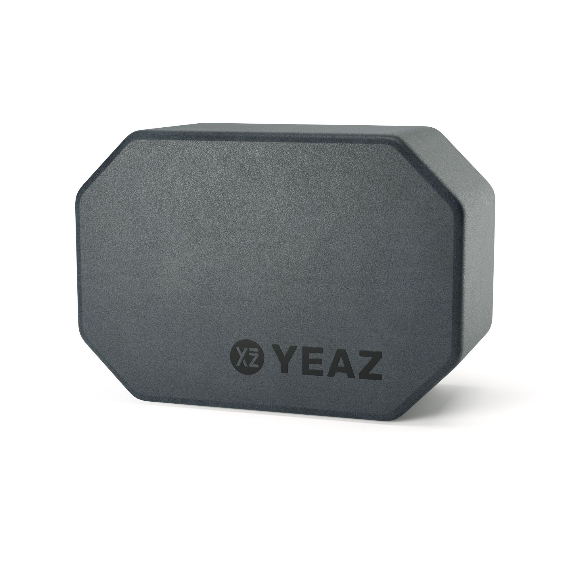 Grauer Yoga-Block mit achteckiger Form. Das Logo YEAZ ist auf der Oberfläche sichtbar.