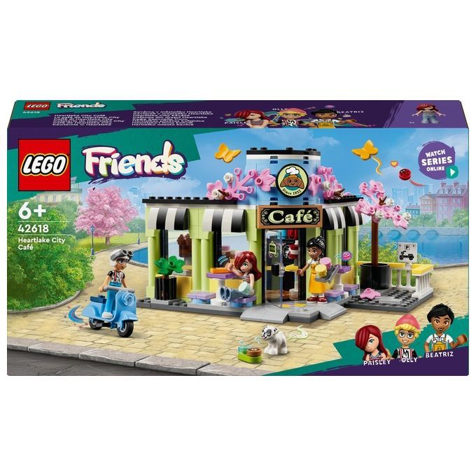 Set LEGO Friends Heartlake City Café. La confezione mostra un modello di caffè colorato con personaggi e accessori. Il set include il logo LEGO, il nome del prodotto, l'età consigliata 6+ e il numero articolo 42618. Il caffè ha una tenda da sole, un tavolo, sedie e uno scooter.