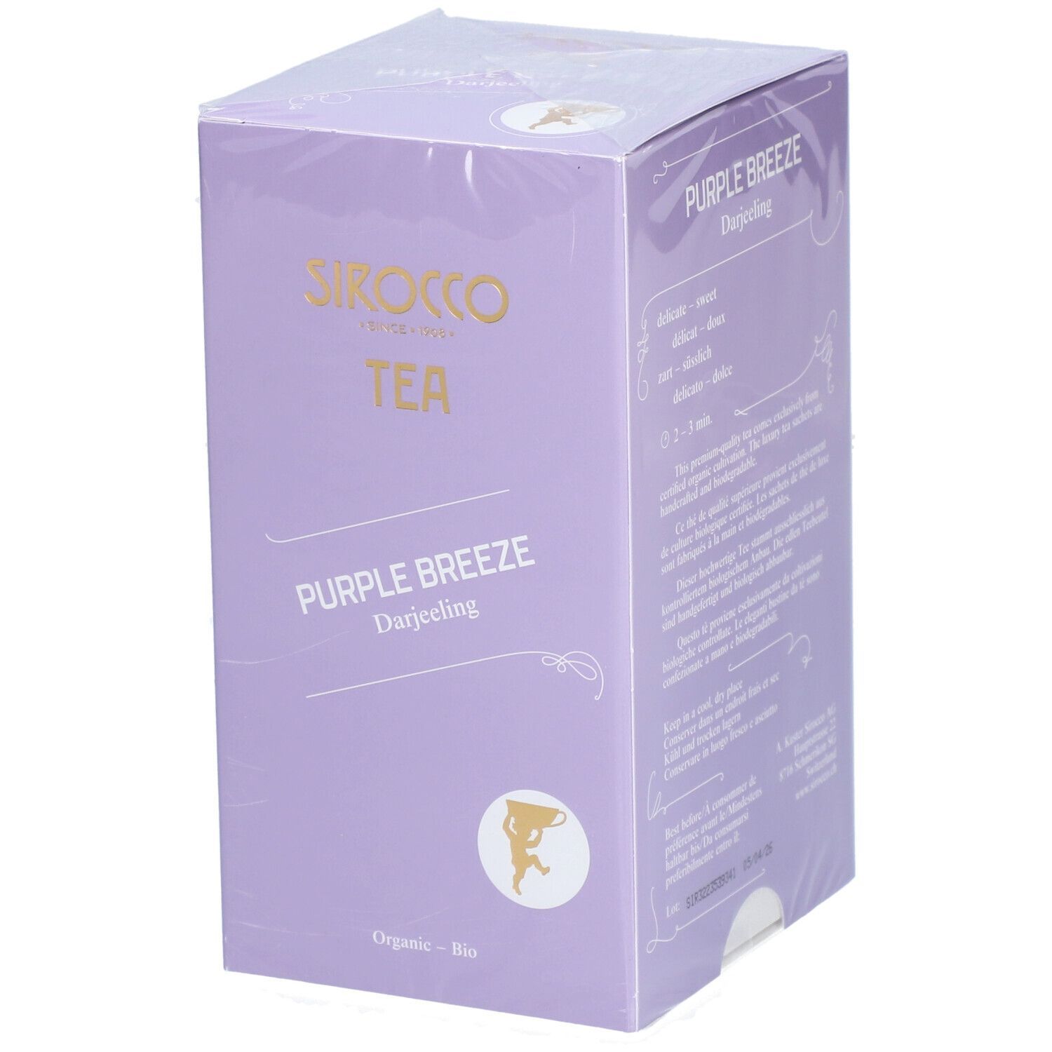 Lila Teebox mit Aufschrift "Sirocco Tea Purple Breeze Darjeeling". Verpackung mit Siegel.