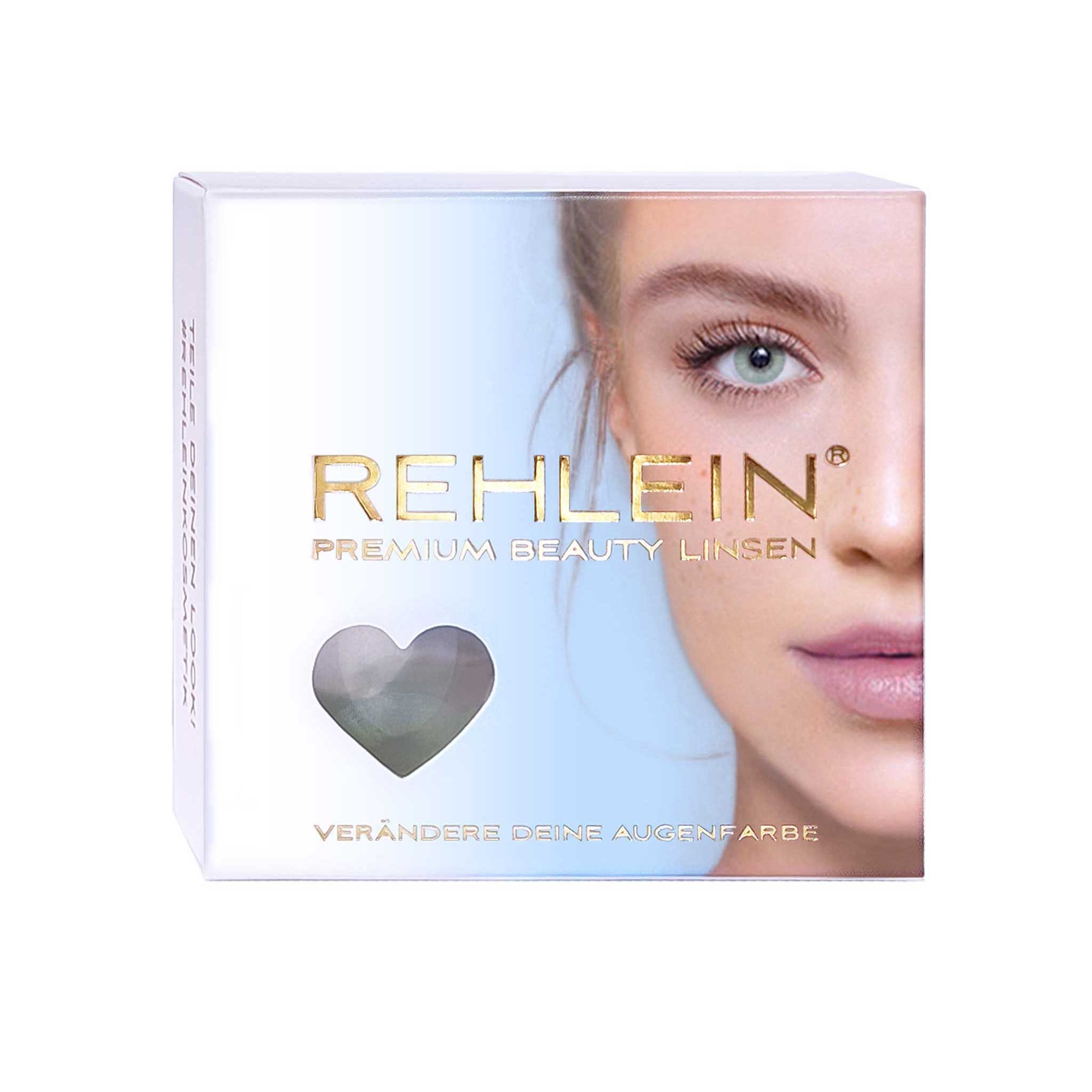 Verpackung von REHLEIN Kontaktlinsen. Aufdruck: REHLEIN, Premium Beauty Linsen. Herz-Symbol. Text: Verändere deine Augenfarbe. Abgebildet: Gesicht einer Frau mit Kontaktlinse.