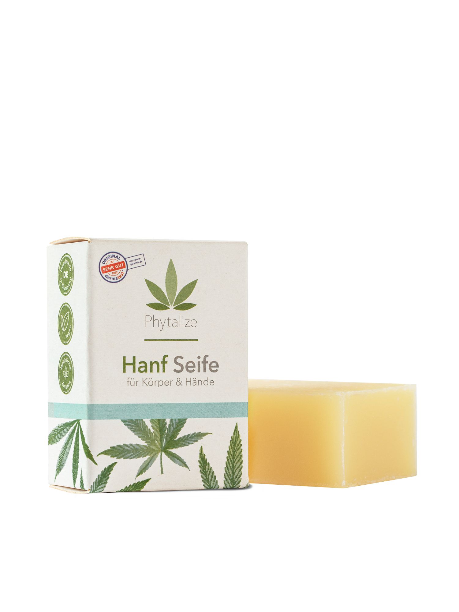 Eine rechteckige Hanf Seife neben einer Verpackung. Die Verpackung zeigt das Logo von Phytalize und den Schriftzug Hanf Seife.