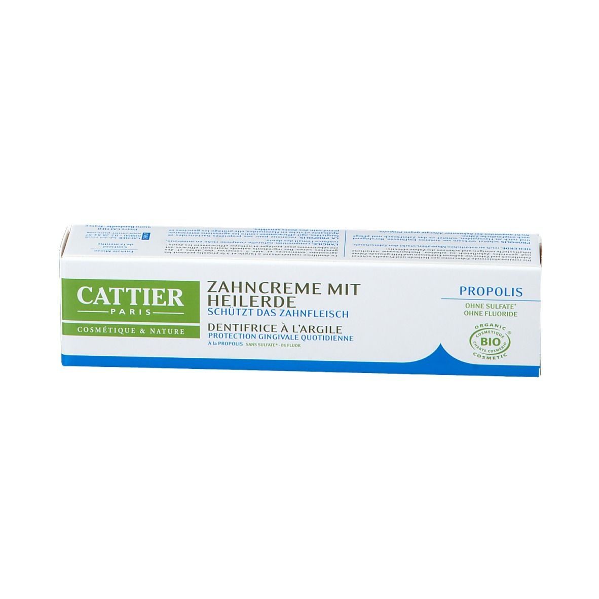 Zahncreme-Schachtel, weiß-grün-blau. Text: CATTIER, Zahncreme mit Heilerde, Propolis, BIO-Siegel.