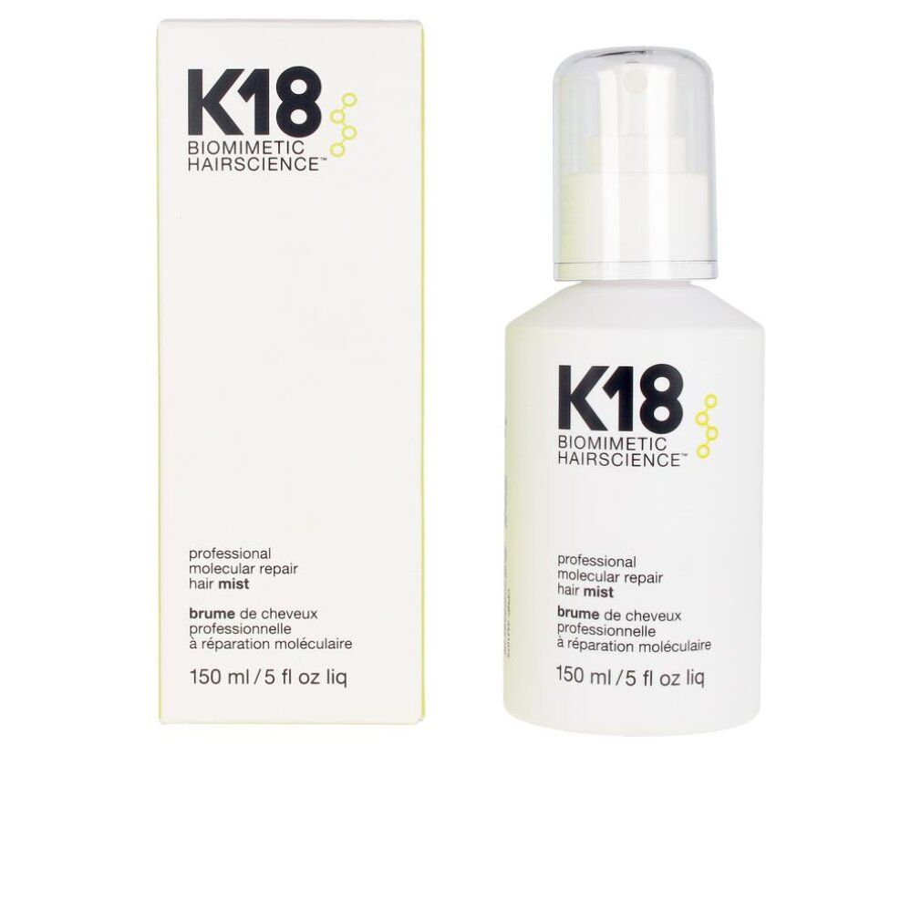 Produkt und Verpackung. Weiße Flasche mit Sprühkopf und Karton. Aufschrift: K18 BIOMIMETIC HAIRSCIENCE, 150 ml.