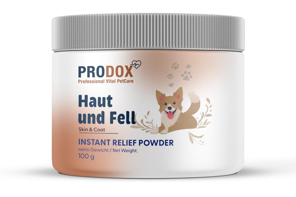 Weißer Behälter mit Deckel. Aufschrift: PRODOX, Haut und Fell, Skin & Coat, INSTANT RELIEF POWDER. Abbildung eines Hundes.