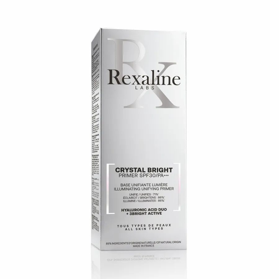 Weiße Verpackung mit Produktnamen: Crystal Bright Primer SPF30. Marke: Rexaline. Enthält Hyaluronsäure und Bright Active.