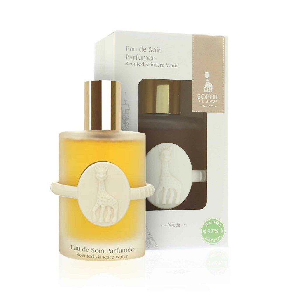 Parfümflakon mit Giraffen-Emblem und Verpackung. Text: Eau de Soin Parfumée, Scented Skincare Water. Logo: Sophie la Girafe. 97% Natural.