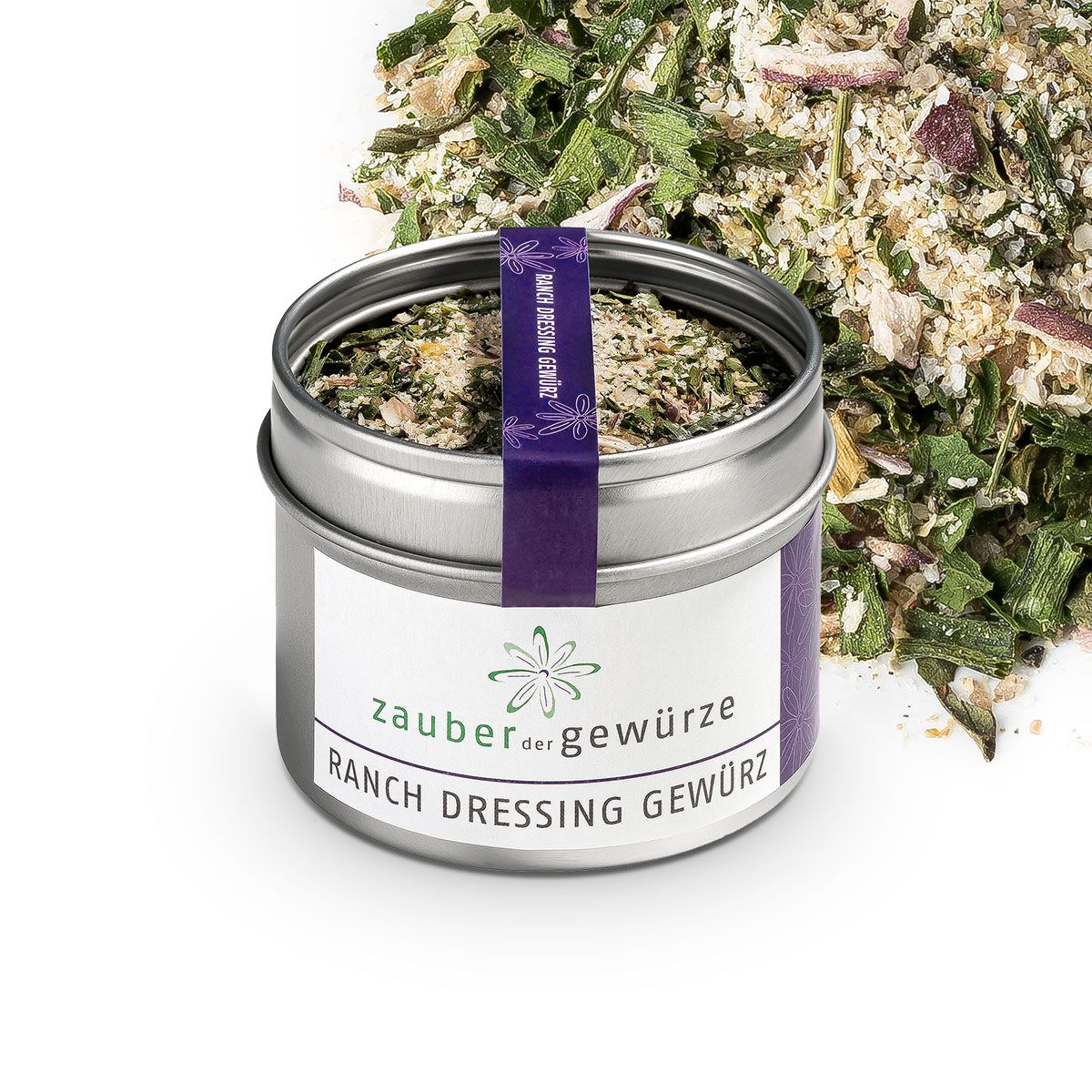 Geöffnete Dose mit Gewürzmischung. Aufkleber mit "Zauber der Gewürze Ranch Dressing Gewürz". Lila Band mit Text.