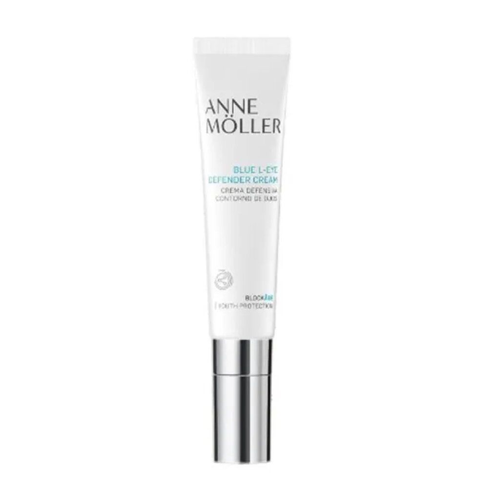 Weiße Tube mit silbernem Verschluss. Aufschrift: Anne Möller, Blue L-Eye Defender Cream. Text in Englisch und Spanisch.