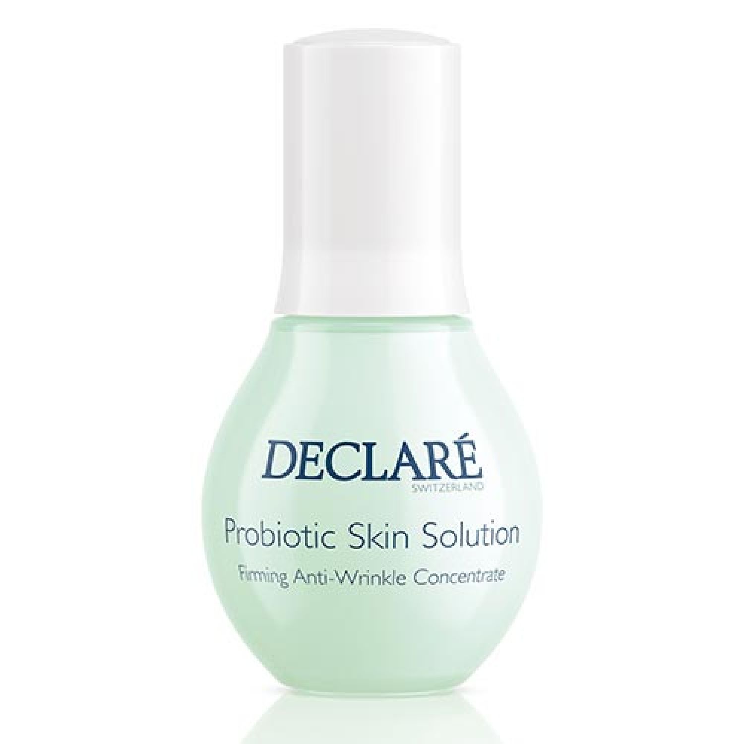 Grüne Flasche mit weißem Deckel. Aufschrift: DECLARÉ SWITZERLAND, Probiotic Skin Solution, Firming Anti-Wrinkle Concentrate.