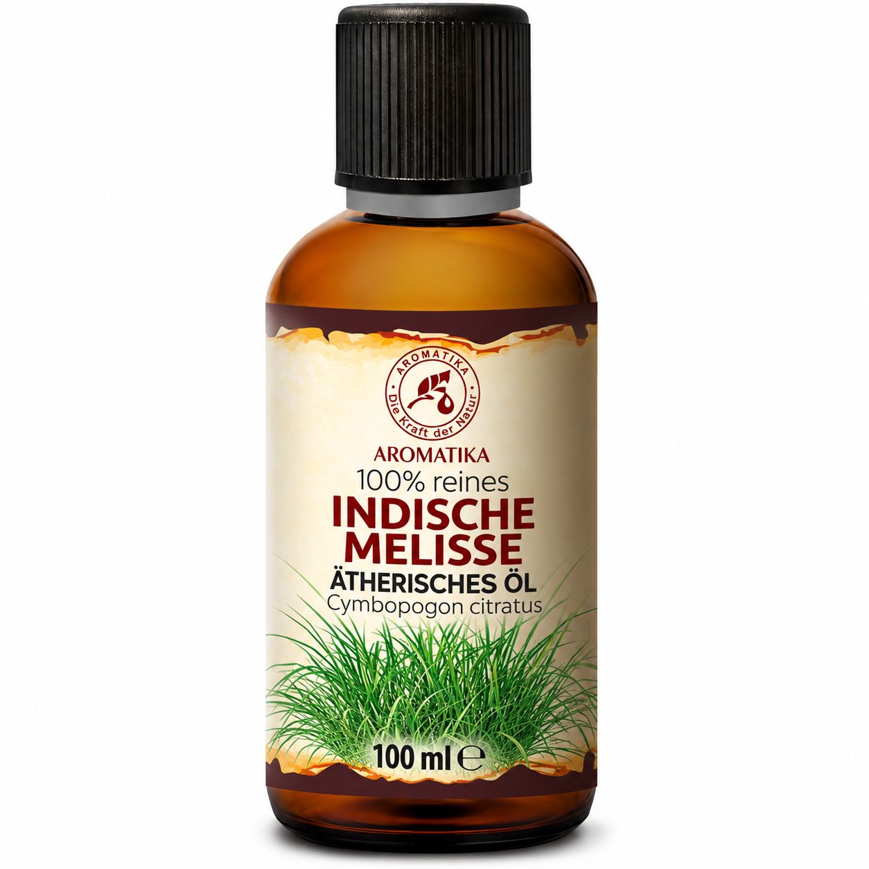 Frau riecht an einer Flasche indischem Melissenöl.
