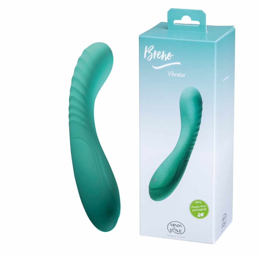 Türkisfarbener Vibrator neben Verpackung. Verpackung mit Produktabbildung, Produktname und Logo.