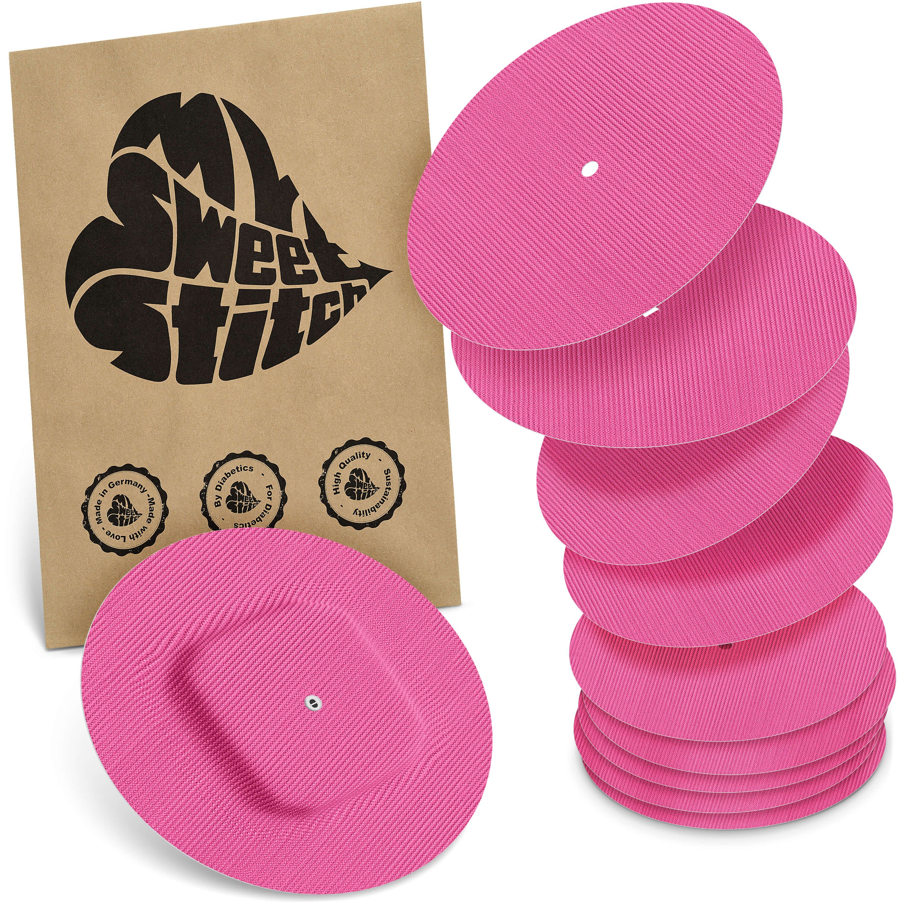 Rosa, ovale Pflaster mit einem Loch und einem rechteckigen Bereich. Verpackung mit Logo "My Sweet Stitch".