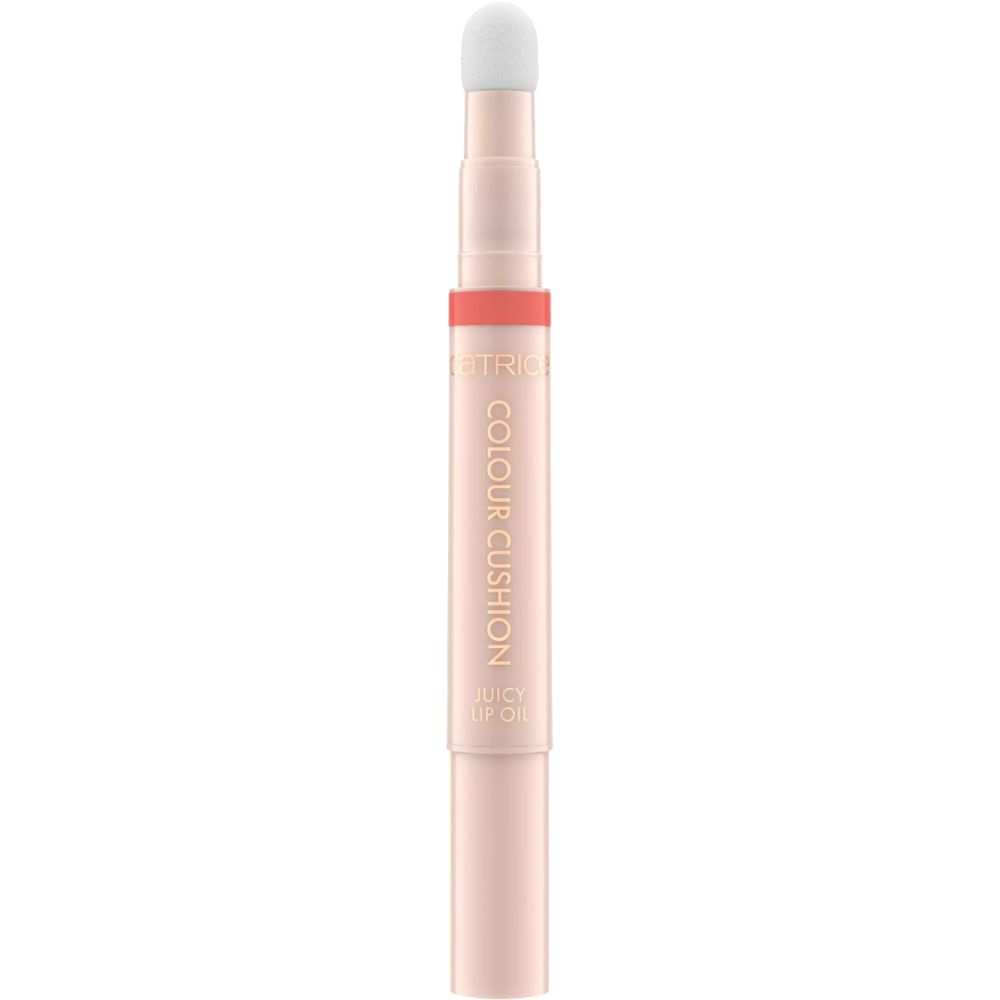 Ein rosafarbener Lippenstift mit Applikator und der Aufschrift 'COLOUR CUSHION JUICY LIP OIL'.