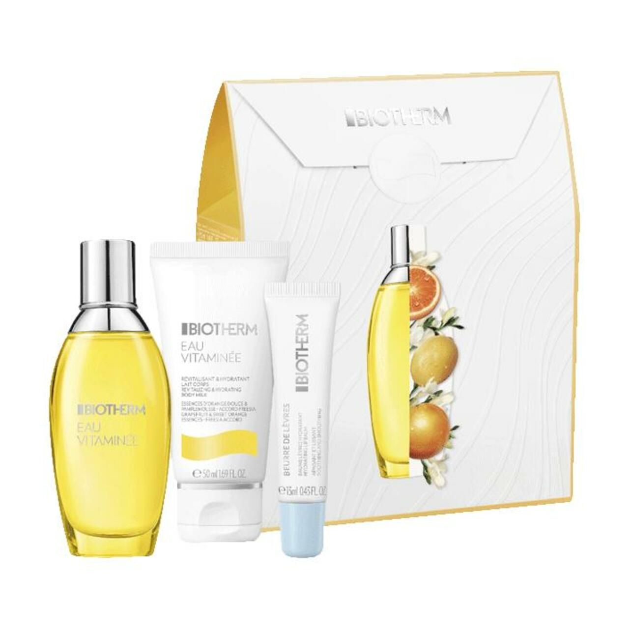 Set mit Eau Vitaminée Flakon, Creme und Lippenbalsam. Verpackt in einer Geschenkbox mit Biotherm-Logo und Orangen-Motiv.