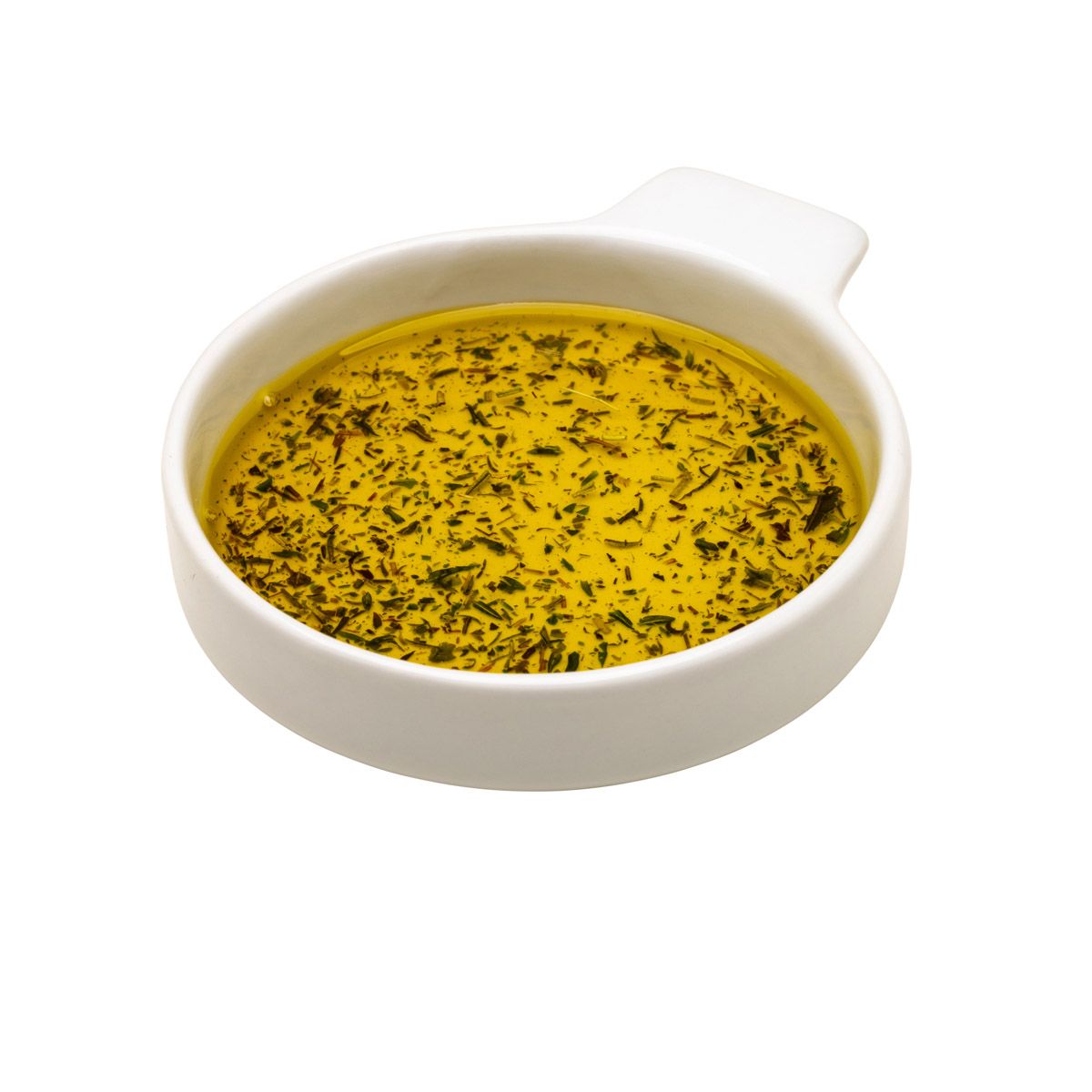 Weiße Schale mit gelber Flüssigkeit und Kräutern. Runde Form mit Griff. Nahaufnahme.