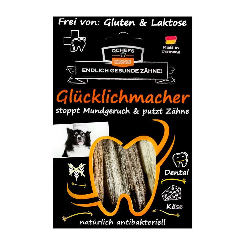 Produktverpackung von QCHEFS Glücklichmacher. Enthält Produktbilder, Text und Logos. Schwarzer Hintergrund.