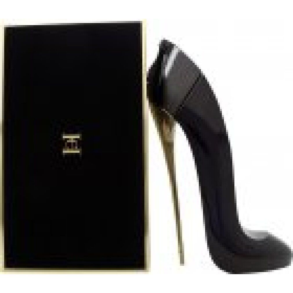 Schwarzer Flakon in Schuhform und Verpackung. Auf der Verpackung steht "Good Girl" und "Carolina Herrera".