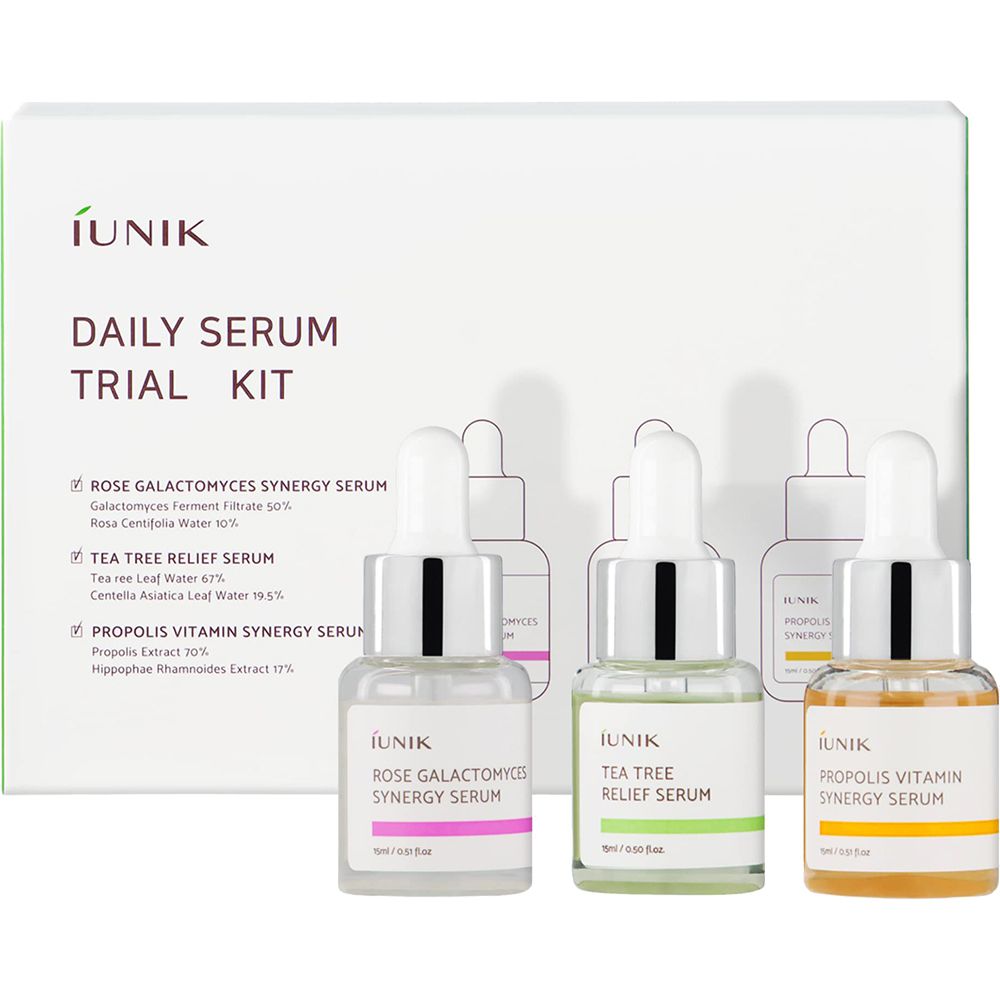 Set mit drei Seren und einer weißen Verpackung. Auf der Verpackung steht "IUNIK DAILY SERUM TRIAL KIT". Die Seren sind in Glasflaschen mit Pipetten.