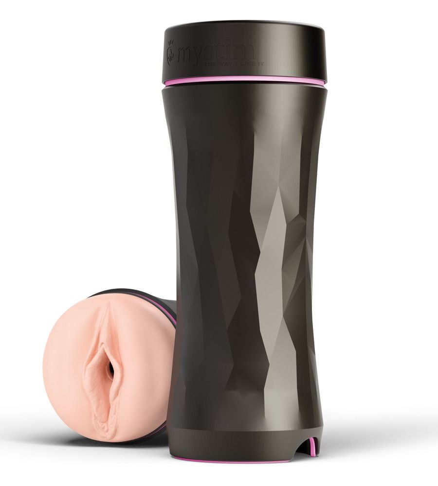 Schwarzes Gerät mit rosa Akzenten und einer rosa-farbenen, anatomisch geformten Öffnung. Geometrische Oberfläche.